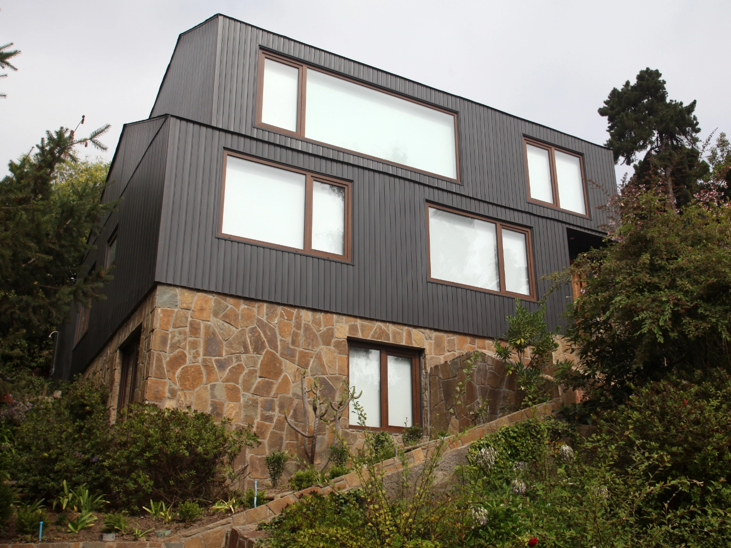 Building made with arkosiding h